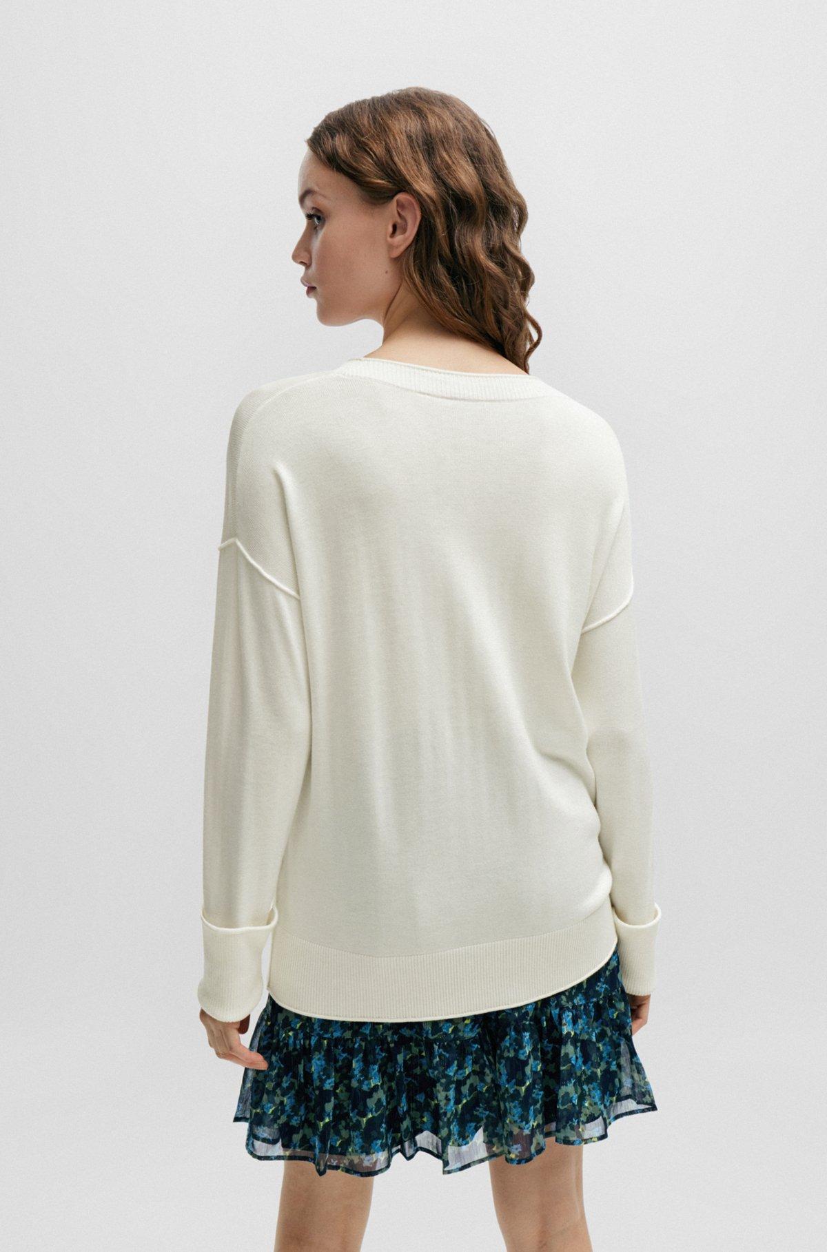 Crew-neck sweater with slit cuffs Product Image