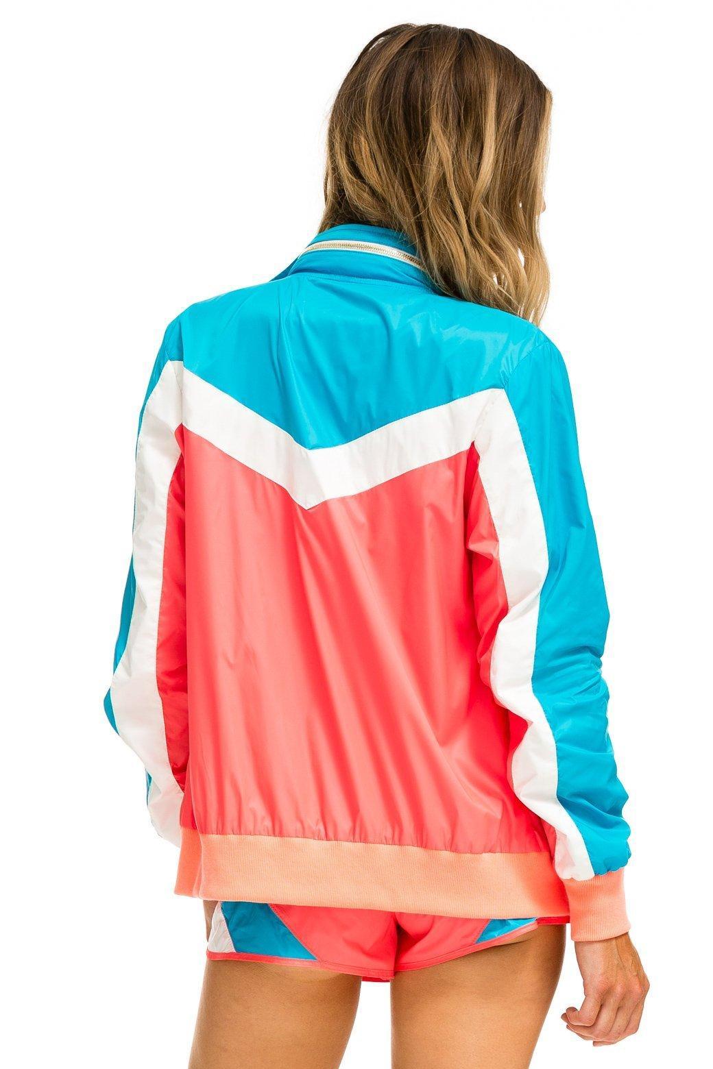 WINDBREAKER JACKET- NEON CORAL Female Product Image