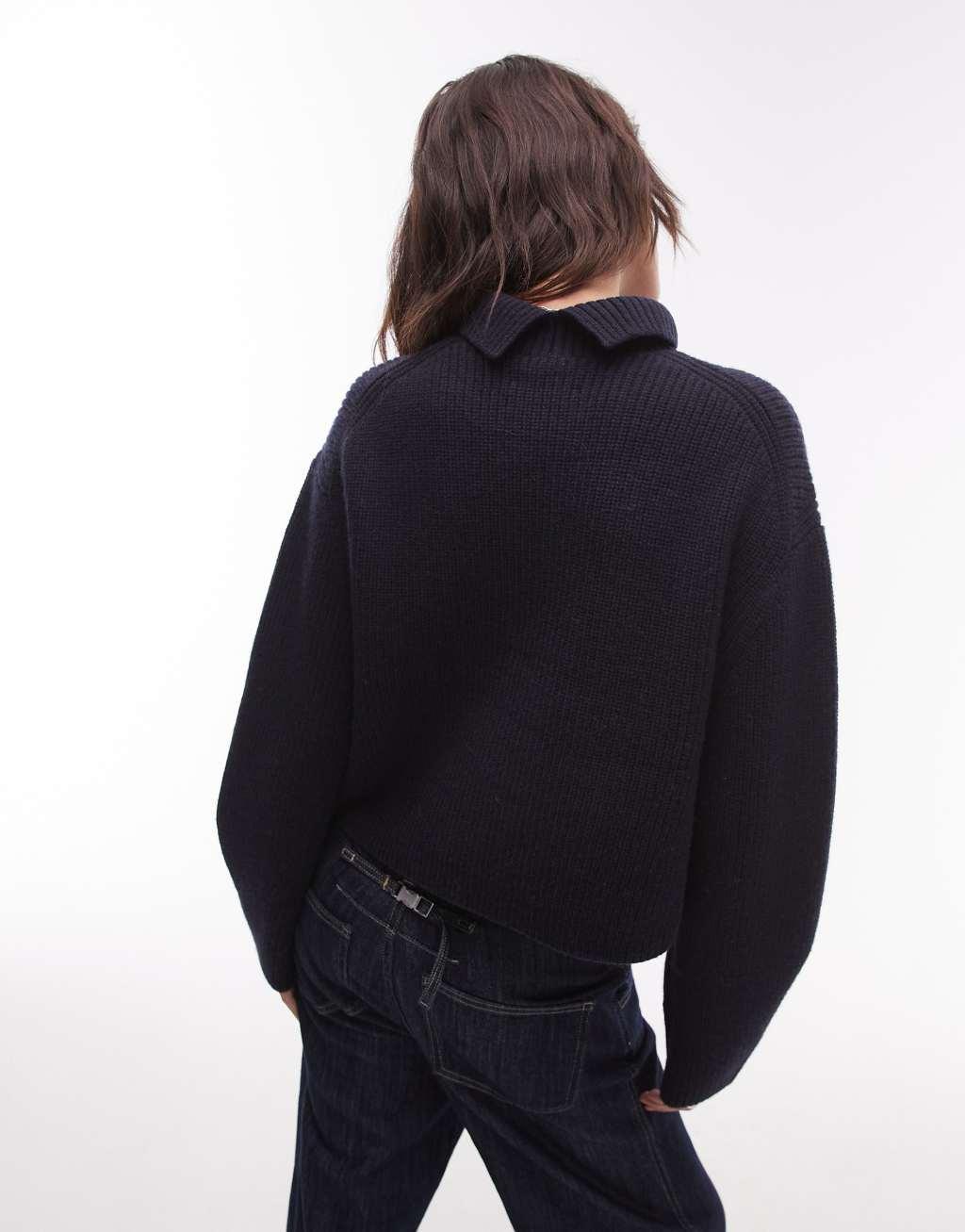 & Other Stories wool knit ribbed funnel neck sweater with split back neck and volume sleeves in dark blue Product Image