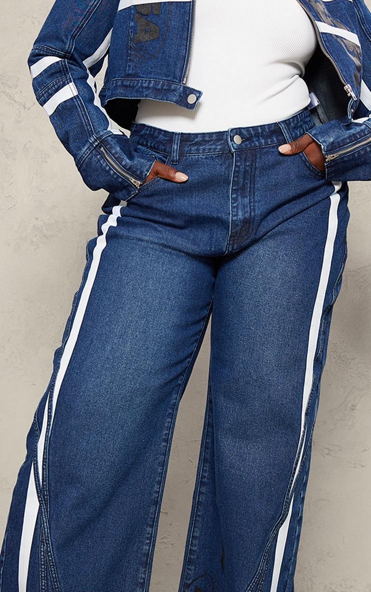 Plus Mid Blue Wash Graphic Detail Panelled Wide Leg Jeans Product Image