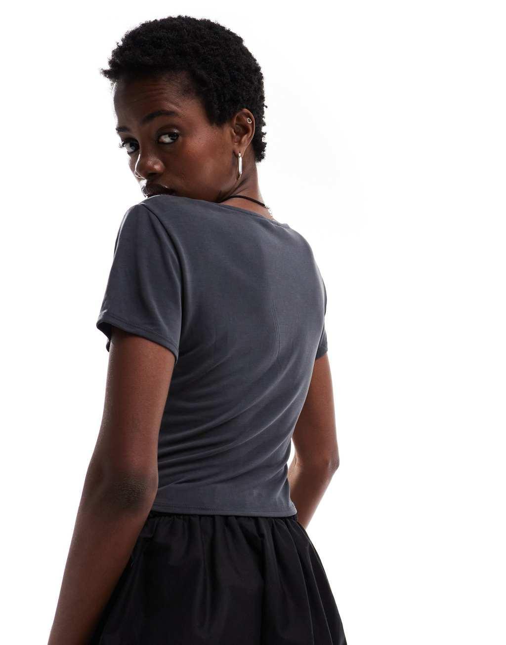 Monki super soft cropped short sleeve top with wrap front detail in black Product Image