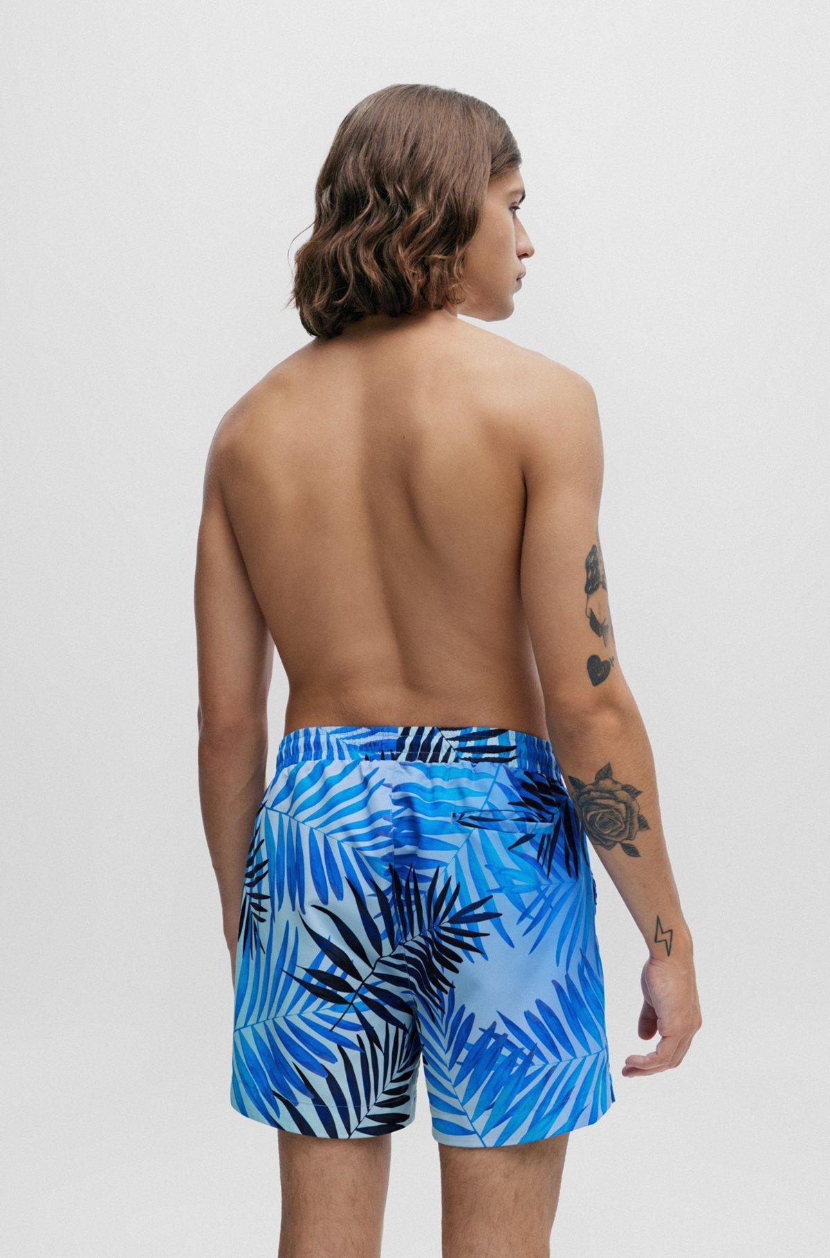 Fully lined swim shorts with seasonal print Product Image