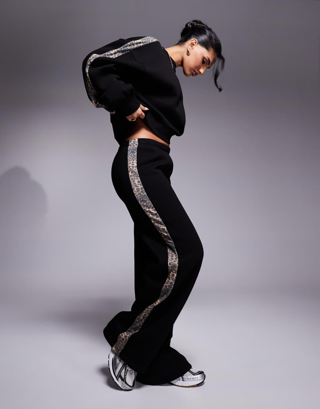 ASOS DESIGN wide leg sweatpants with leopard side stripe in black - part of a set Product Image