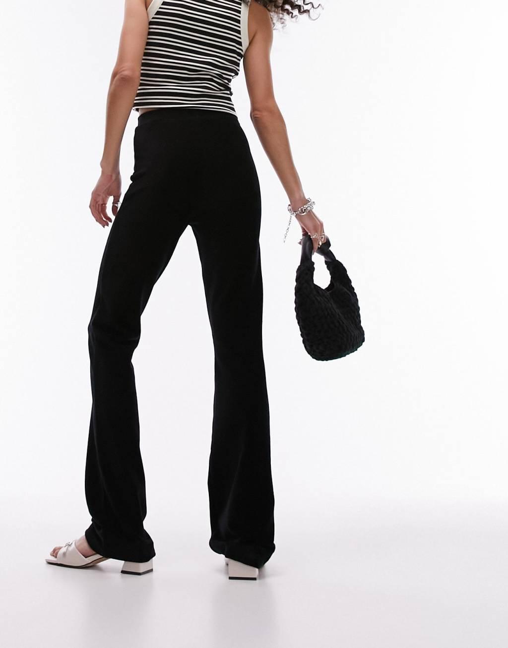 Topshop stretchy cord flared pants in black Product Image