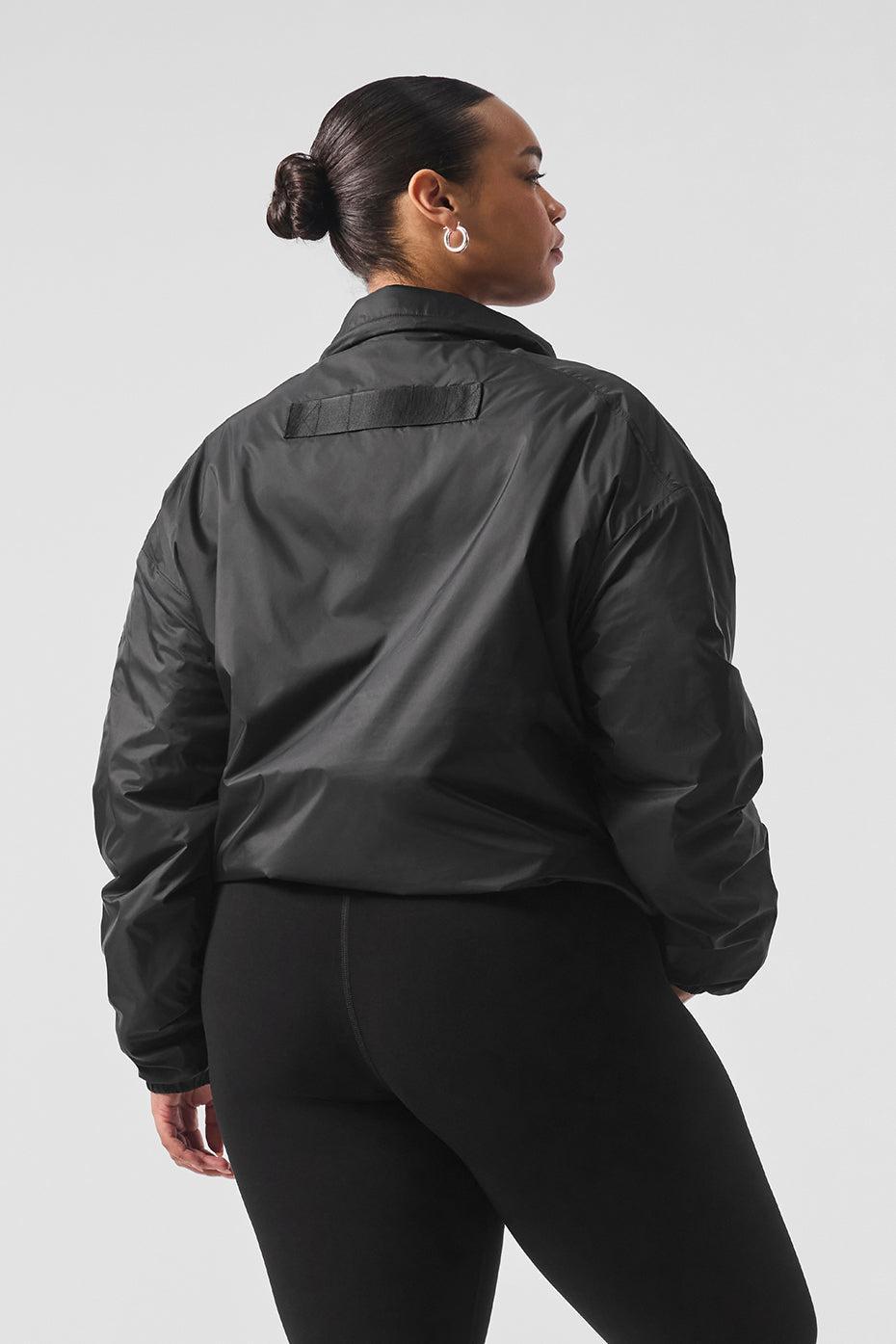 Latitude Light Weight 1/2 Zip Pullover Jacket - Black Female Product Image