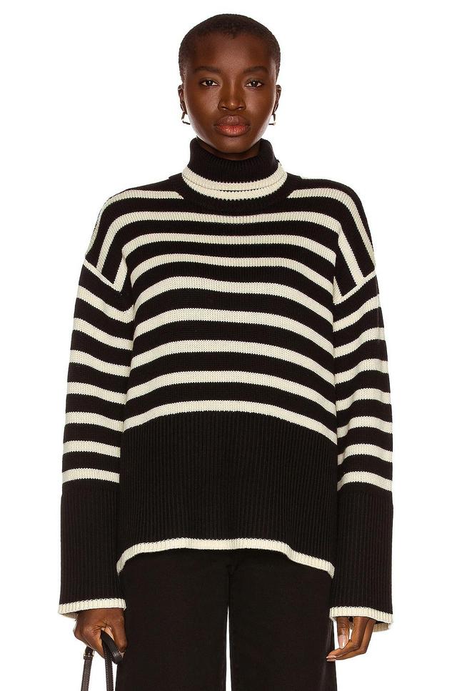 Toteme Signature Stripe Turtleneck Sweater in Black Stripe - Black. Size L (also in M, S, XS). Product Image