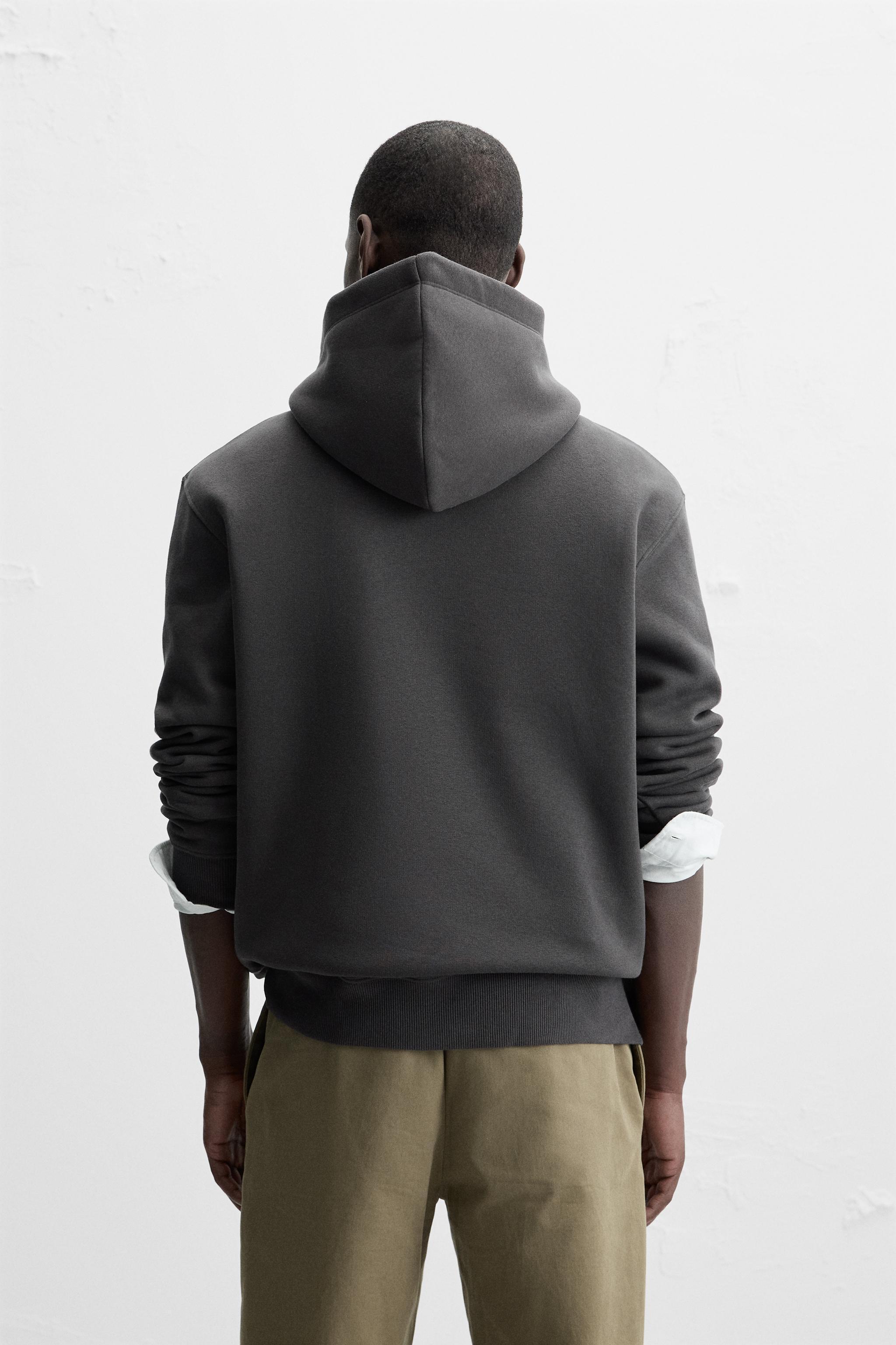 HOODED SWEATSHIRT WITH TEXT Product Image