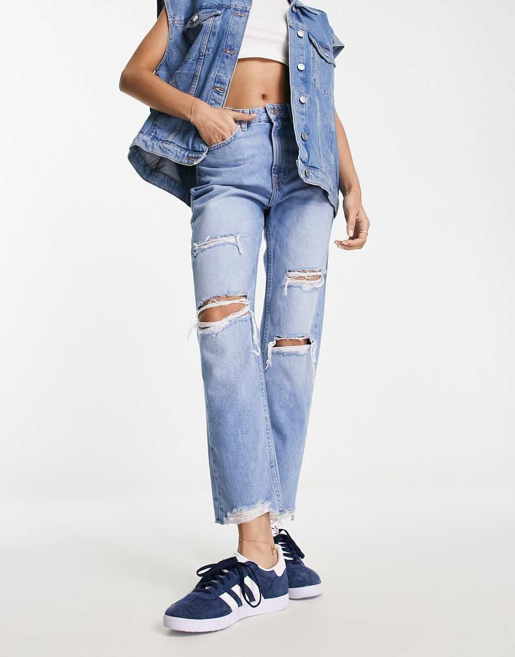 Bershka comfort fit mom jean with rips in light blue Product Image