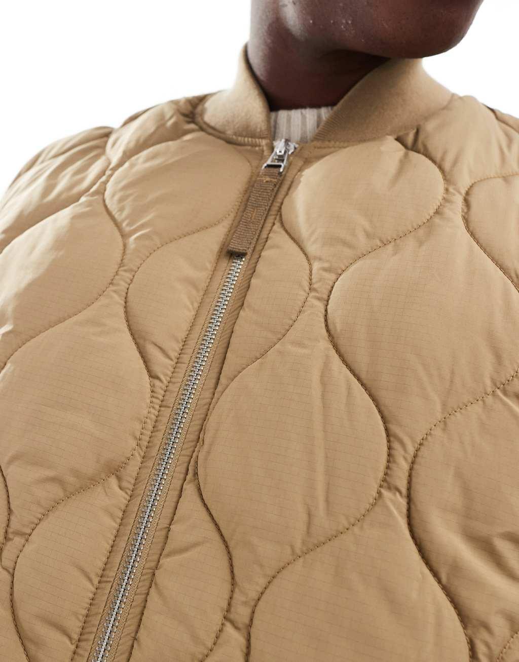 Jack & Jones quilted vest in beige Product Image