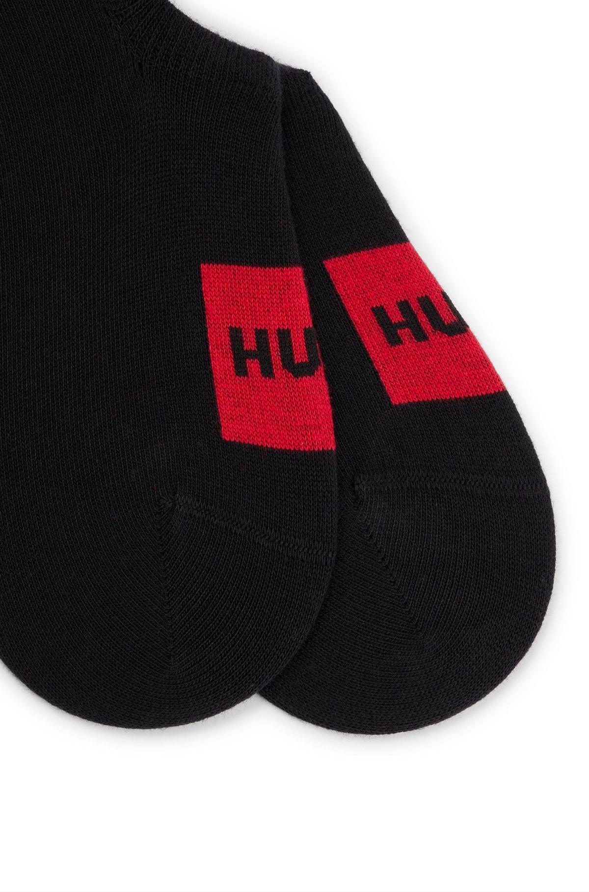 Two-pack of invisible socks with red logo labels Product Image