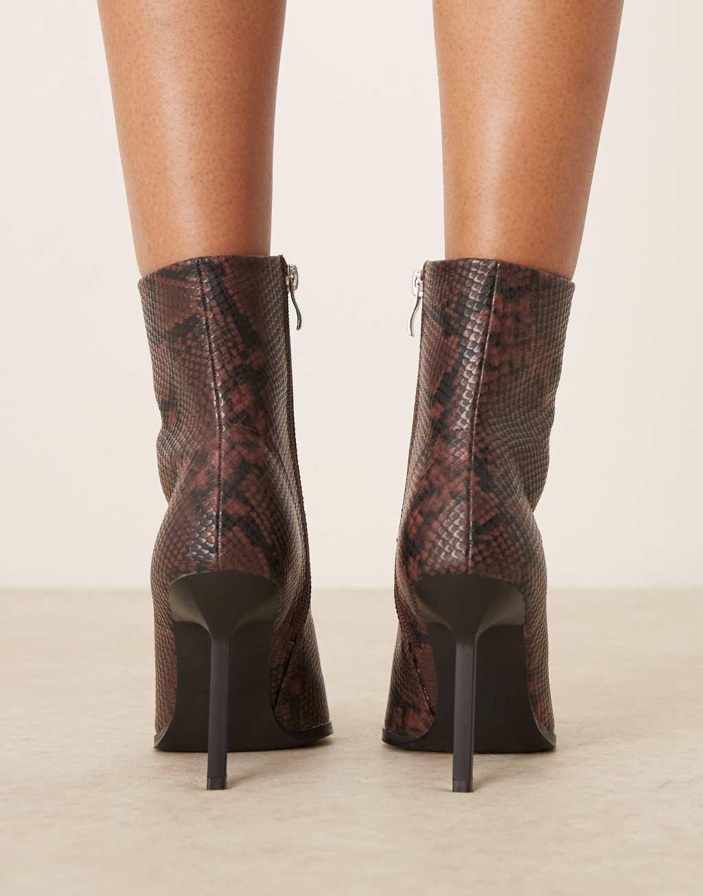 RAID Elvio heeled ankle boots in snake Product Image