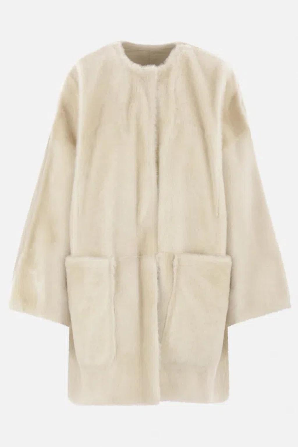 Coats In Beige Product Image