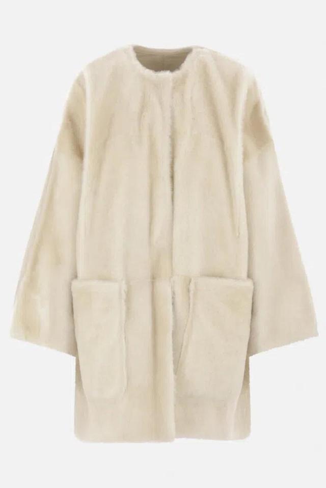 Coats In Beige Product Image