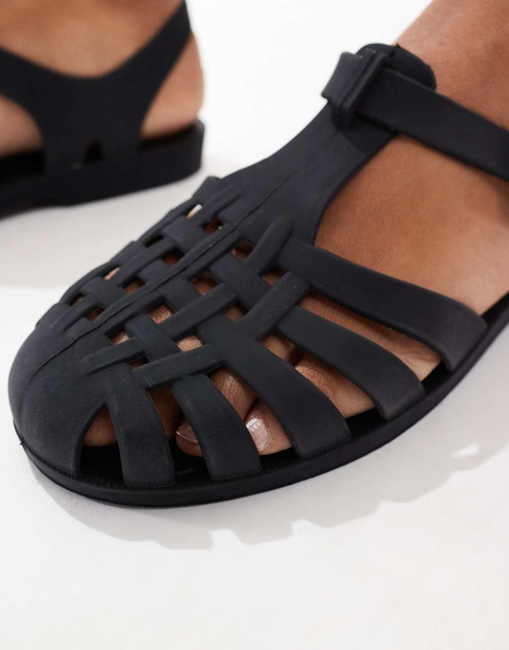 ASOS DESIGN Falcon jelly flat sandals in black Product Image