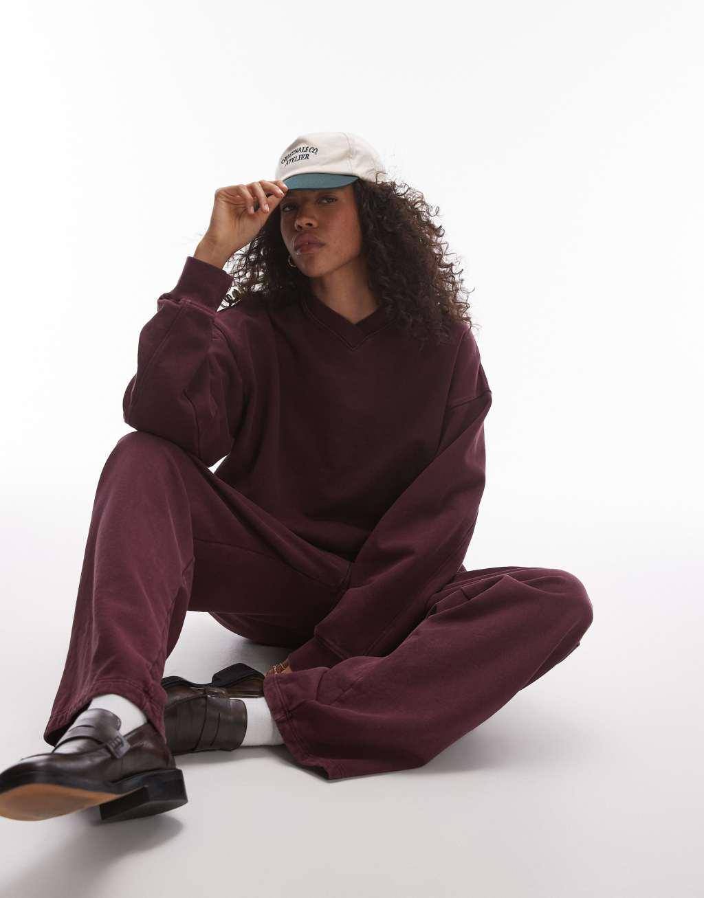 Topshop acid wash wide leg sweatpants in burgundy Product Image