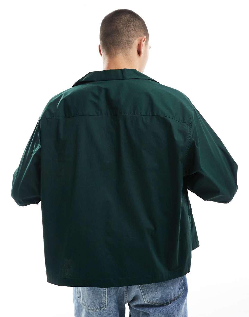 ASOS DESIGN boxy oversized poplin shirt with deep revere collar in dark green Product Image