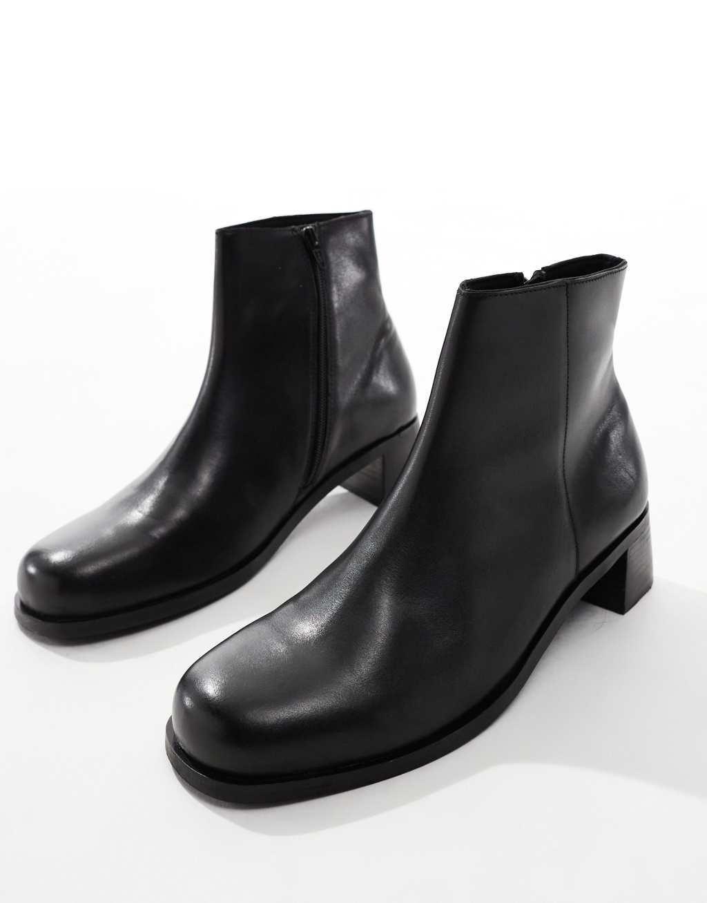 ASOS DESIGN leather heeled boots in black Product Image