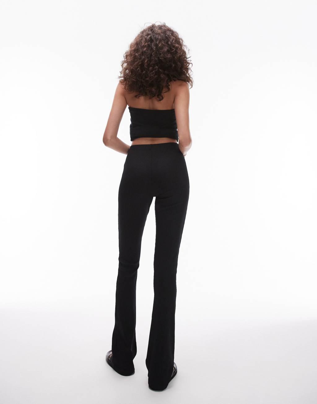 Topshop Tall skinny ribbed flares in black Product Image