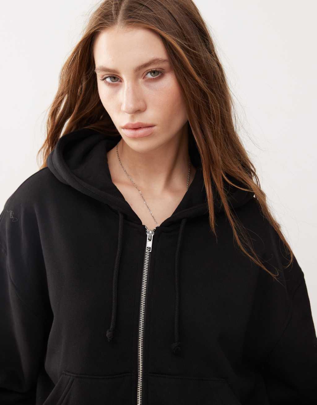 Weekday Essence boxy zip thru hoodie in black Product Image