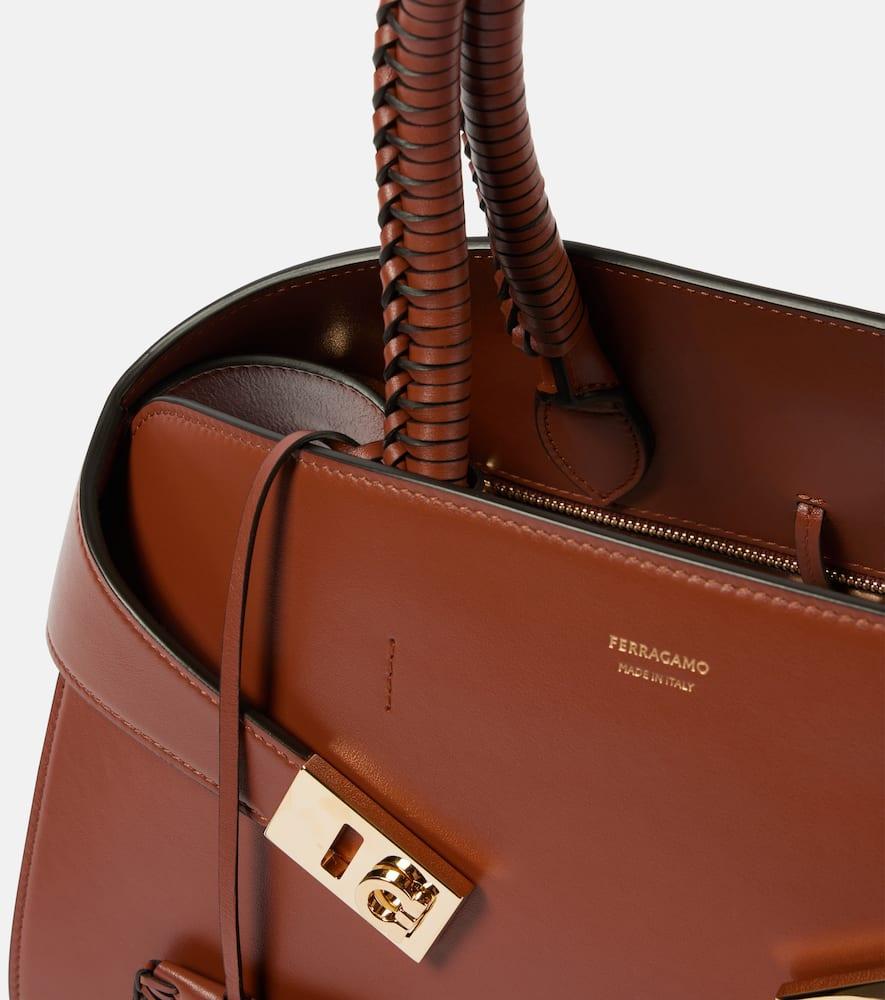 Hug Medium Leather Tote Bag In Brown Product Image