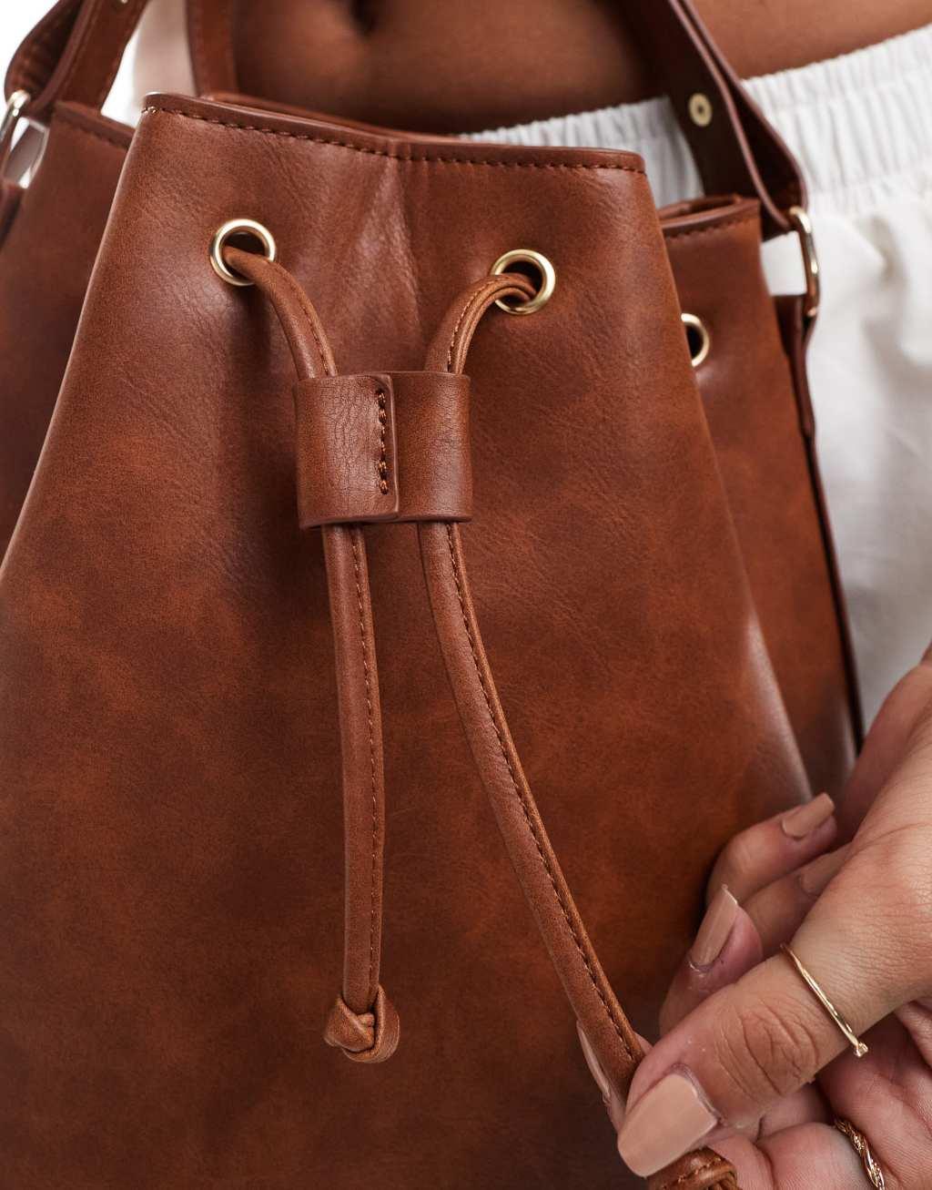 Glamorous crossbody bucket bag in brown  Product Image