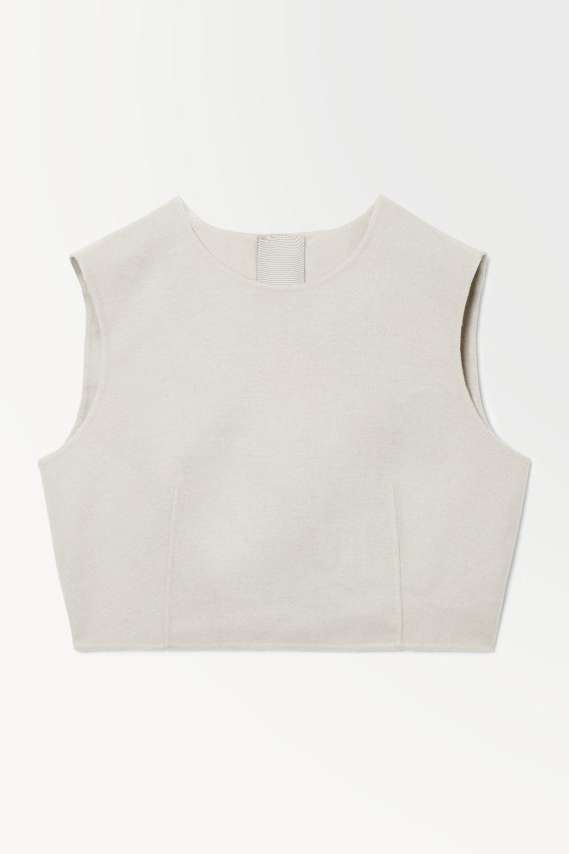 THE LEATHER-TASSELED WOOL TOP Product Image