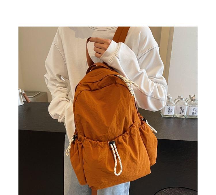 Drawstring Multi-Pocket Backpack Product Image