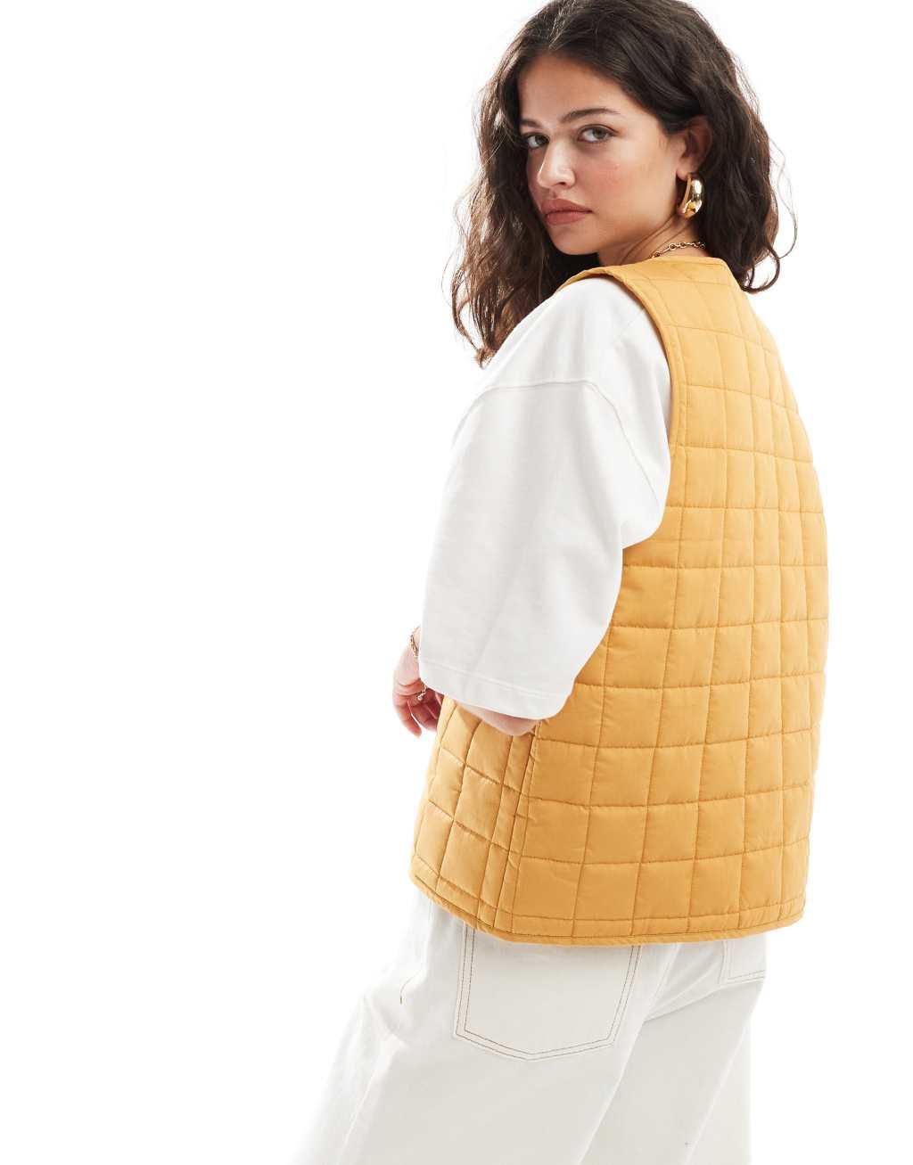 ASOS DESIGN quilted vest in mustard Product Image