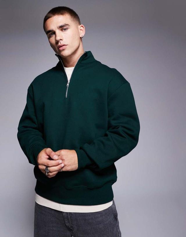 ASOS DESIGN premium heavyweight oversized quarter zip sweatshirt in forest green Product Image