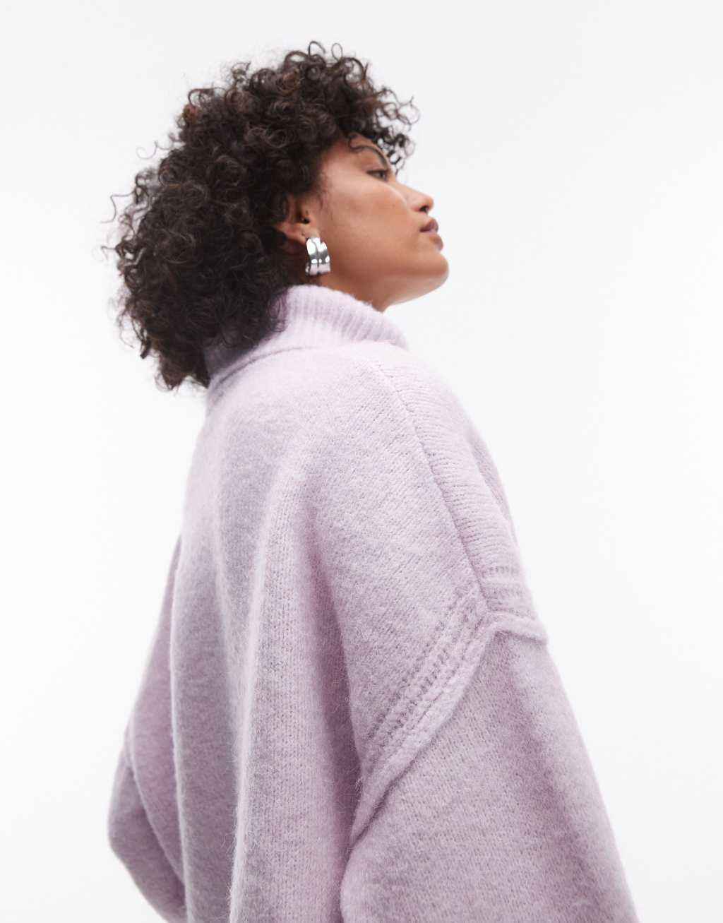 Topshop knitted exposed seam roll neck relaxed sweater in lilac Product Image