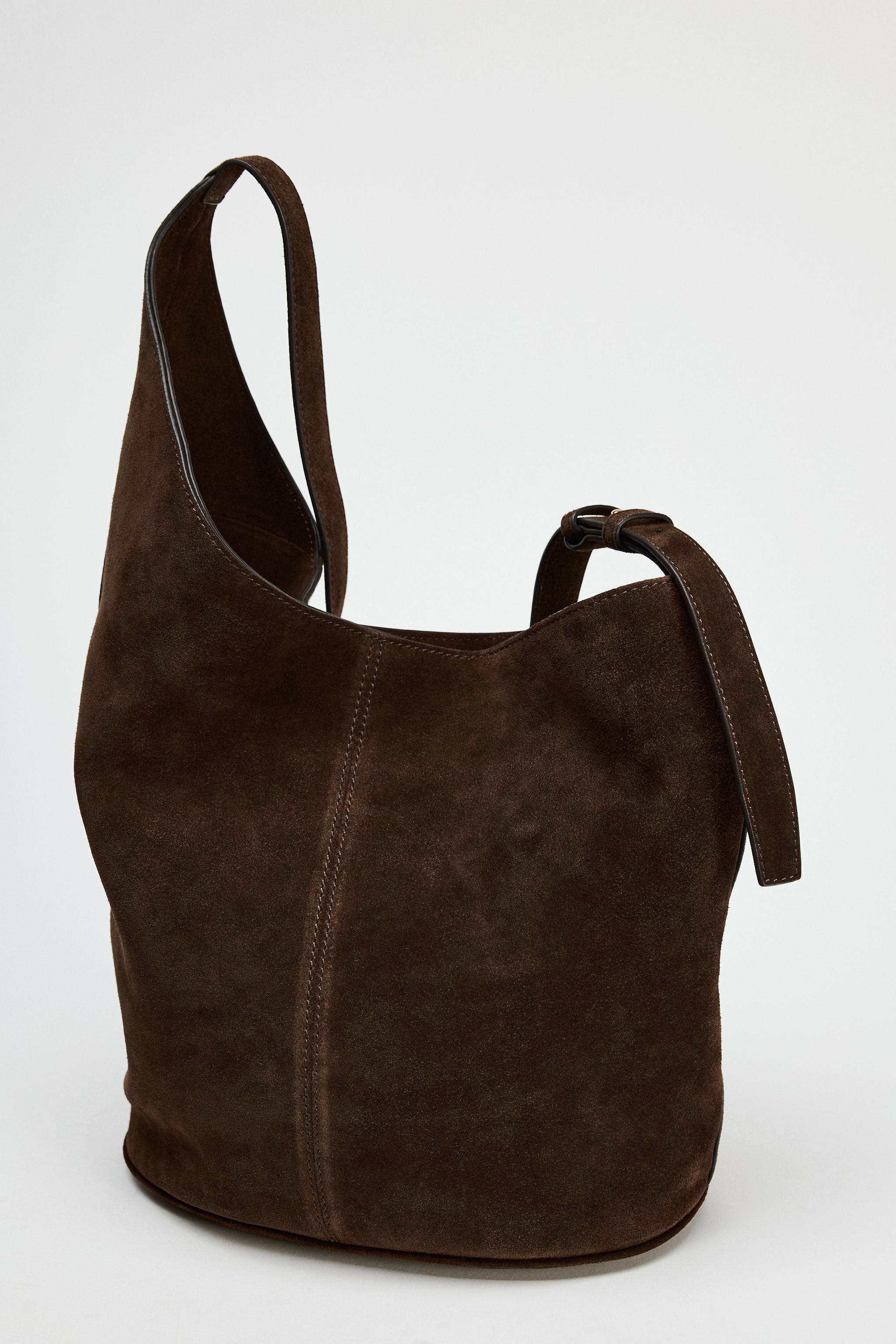 ASYMMETRIC SOFT SPLIT LEATHER BUCKET BAG Product Image