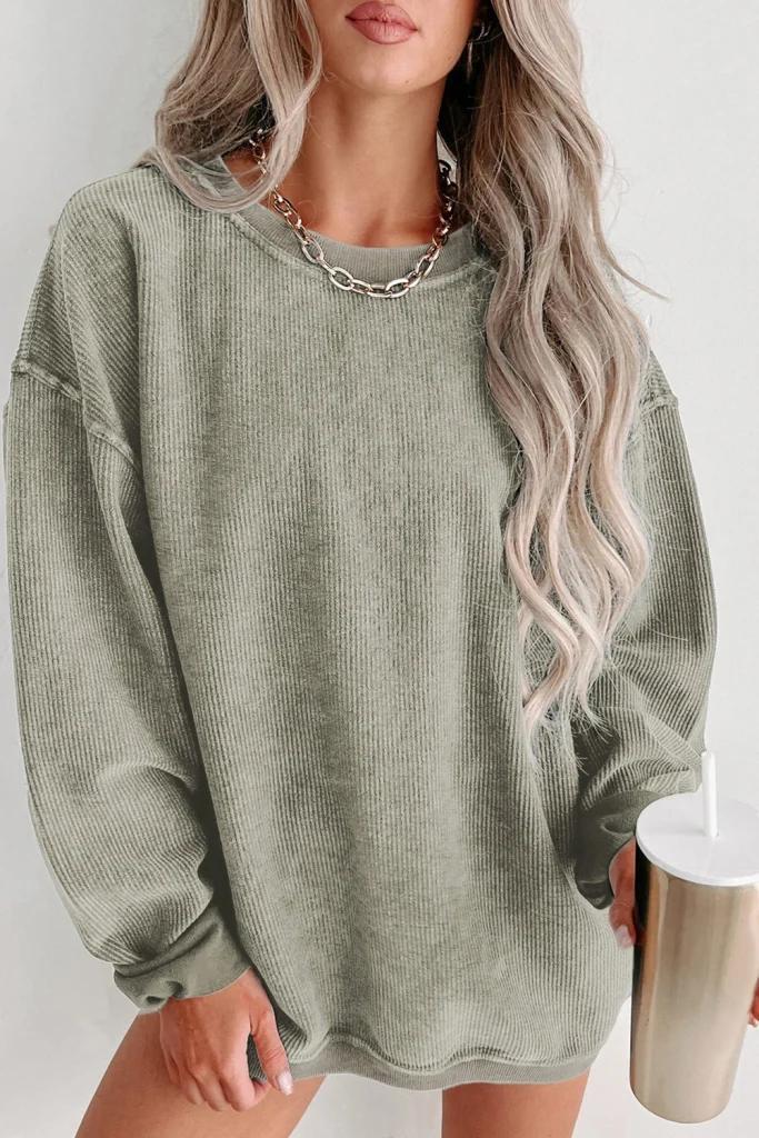 Olivia Mark – Textured Ribbed Knit Round Neck Pullover Sweatshirt in a Neutral Tone Product Image