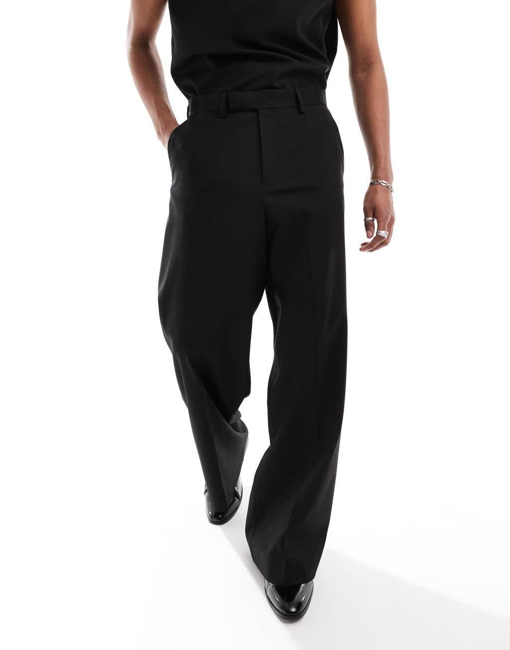 ASOS DESIGN loose leg suit pants in black Product Image