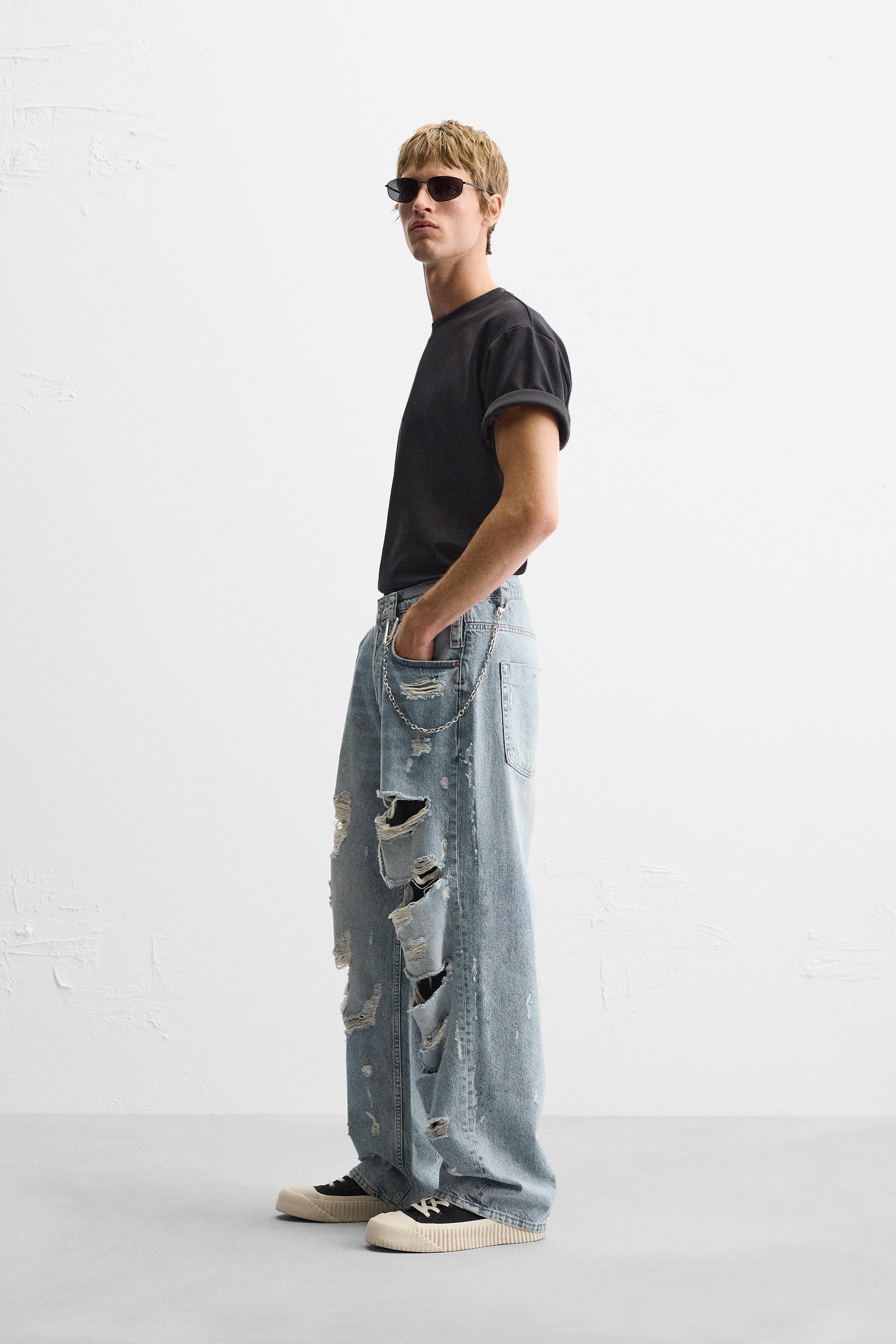 RIPPED EXTREME WASHED JEANS Product Image