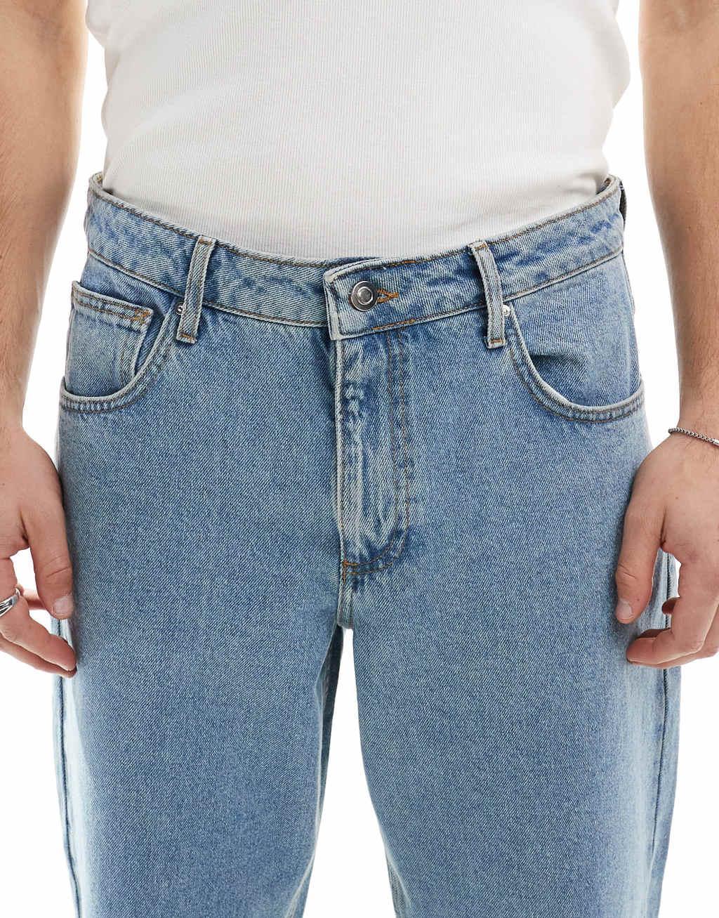 ASOS DESIGN tapered fit jeans in mid wash blue   Product Image