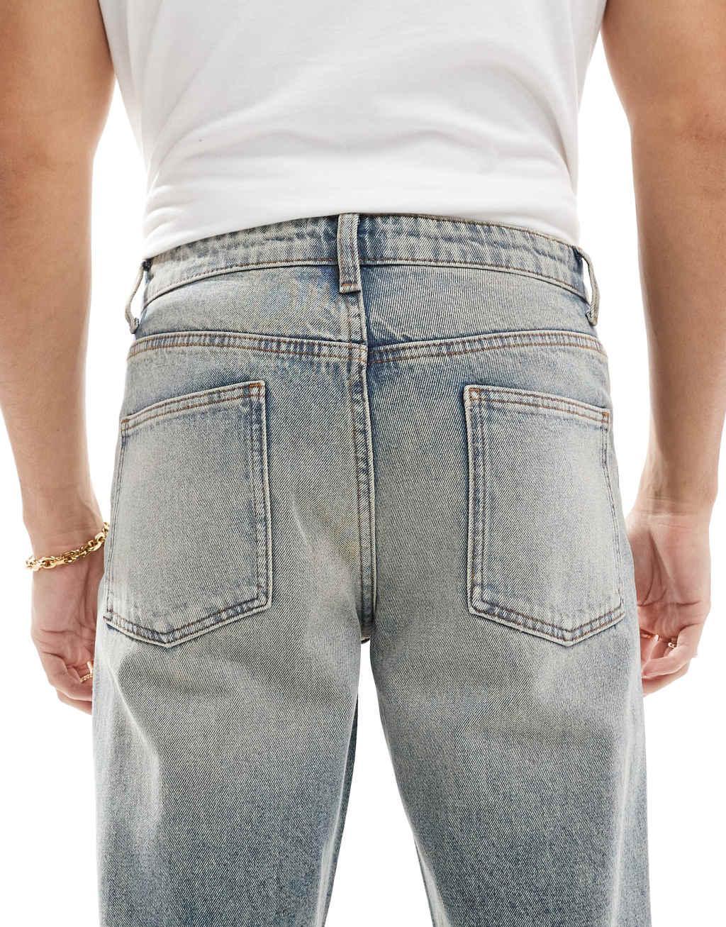 ASOS DESIGN tapered fit jeans in light wash blue  Product Image