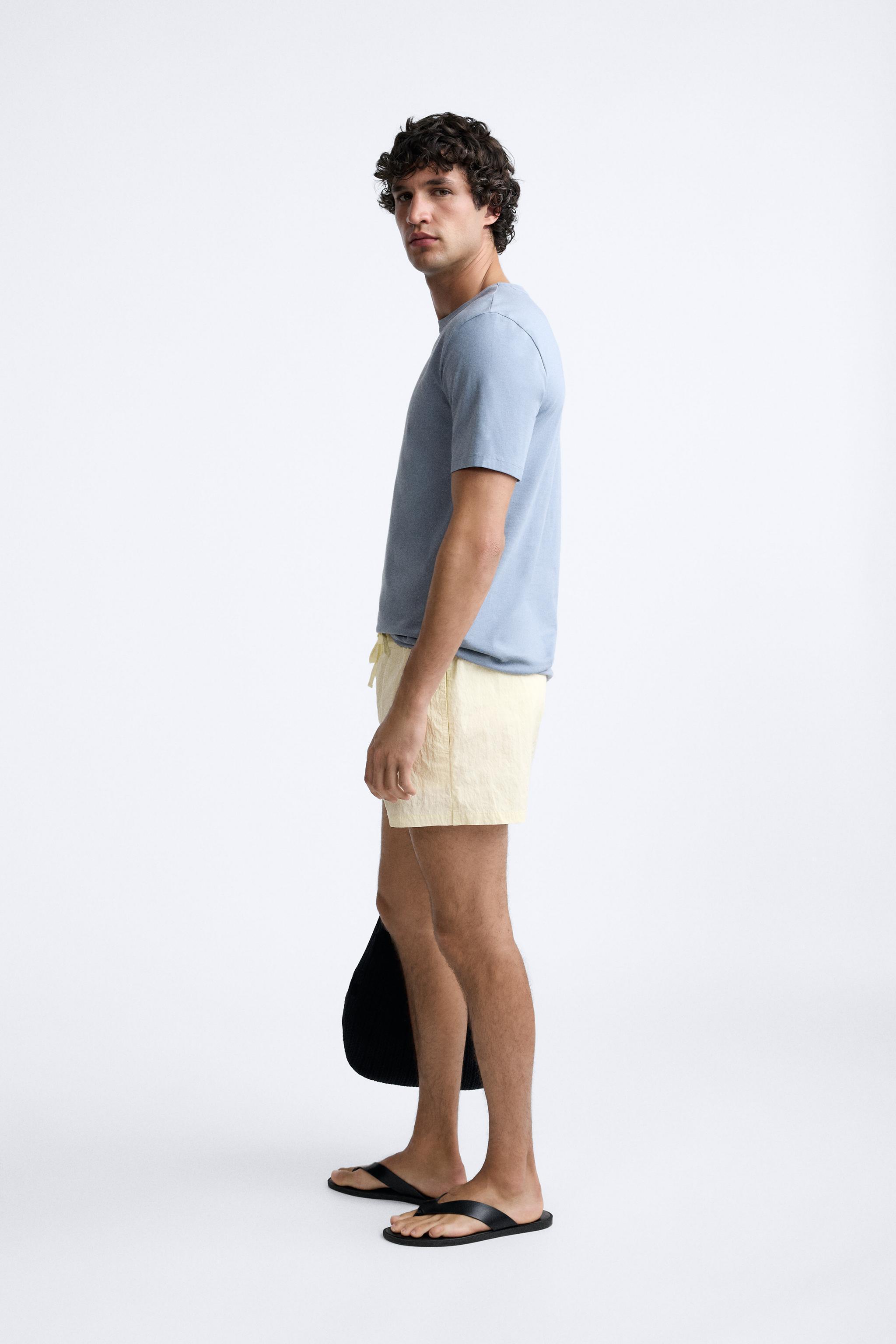 BUTTON SHORT SWIMMING TRUNKS Product Image