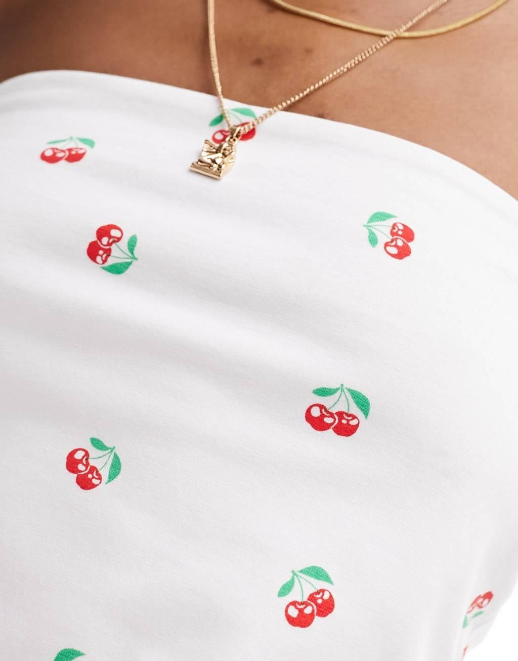 Monki strapless bandeau top in white and cherry print Product Image