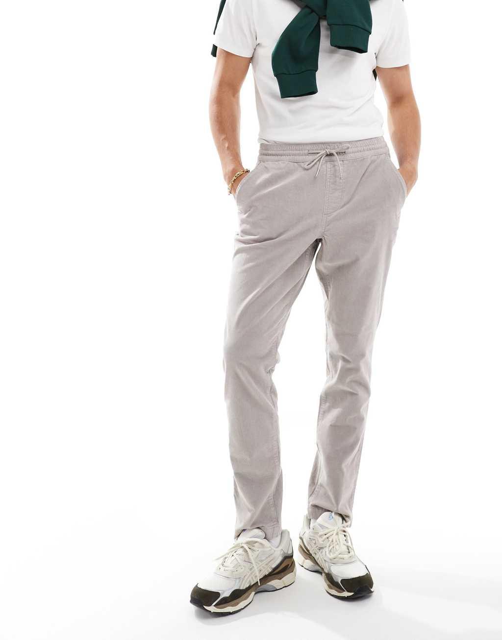 ASOS DESIGN tapered fit cord pants with elasticated waist in gray Product Image