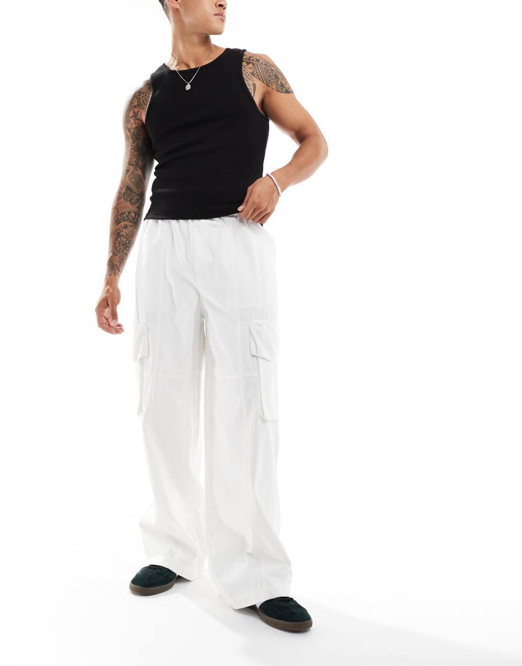 ASOS DESIGN super baggy cargo pants with panel details in ecru Product Image