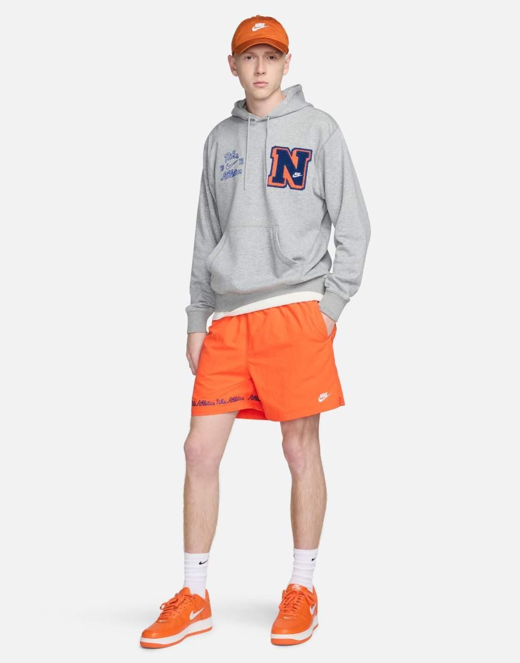 Nike Club varsity shorts in orange Product Image