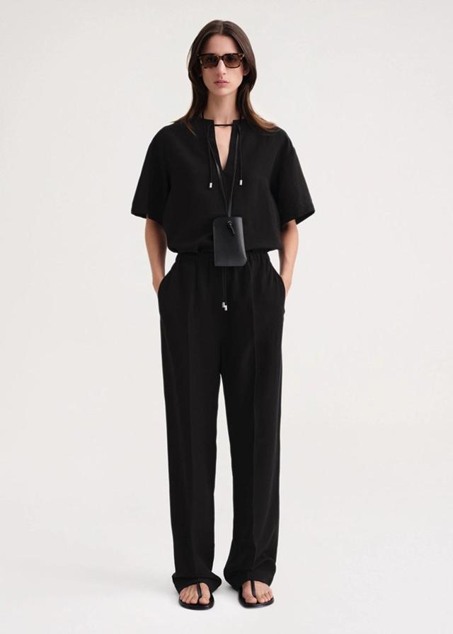 Press-creased Drawstring Trousers Black Product Image