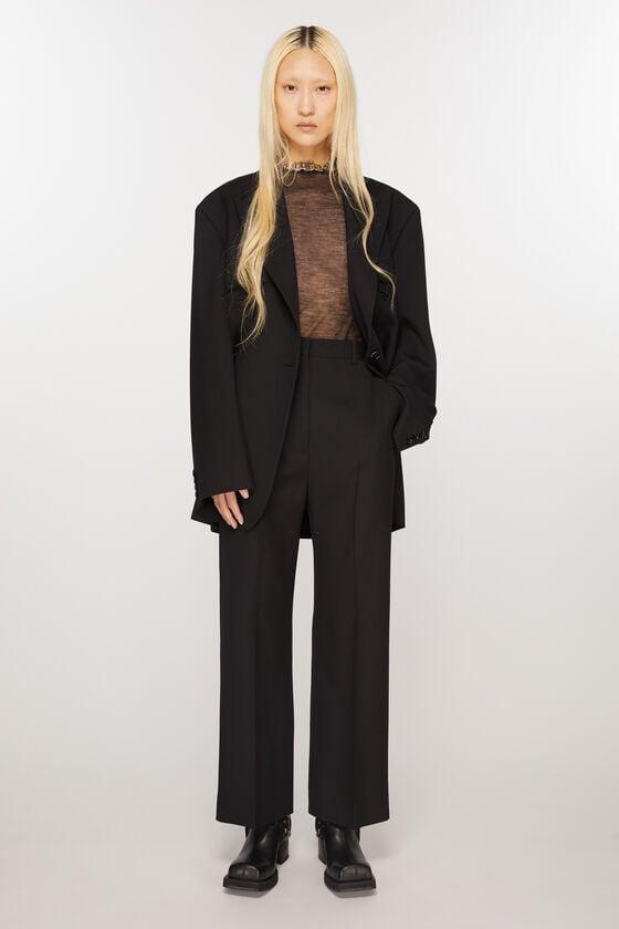 Relaxed tailored trousers Product Image