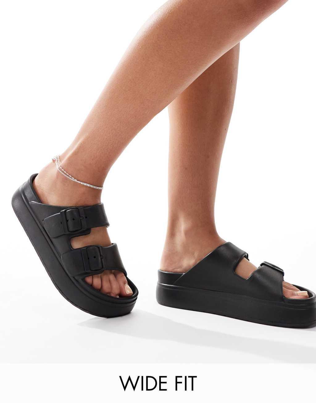 ASOS DESIGN Freestyle flatform double buckle footbed sliders in black Product Image