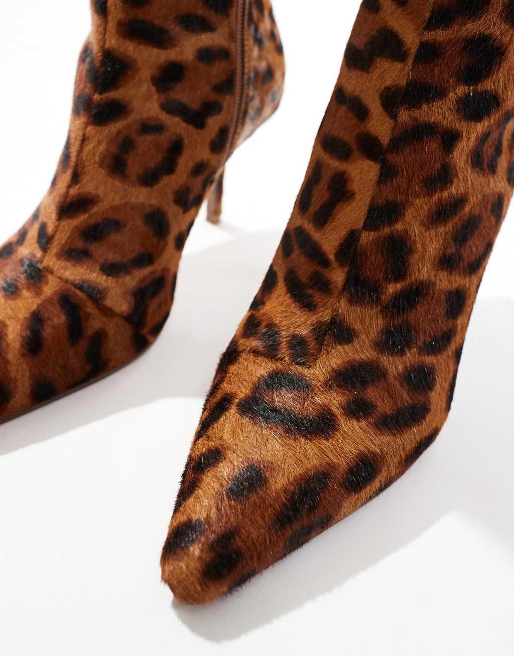 ASOS DESIGN Replay leather pointed toe mid-heel boots in leopard pony Product Image