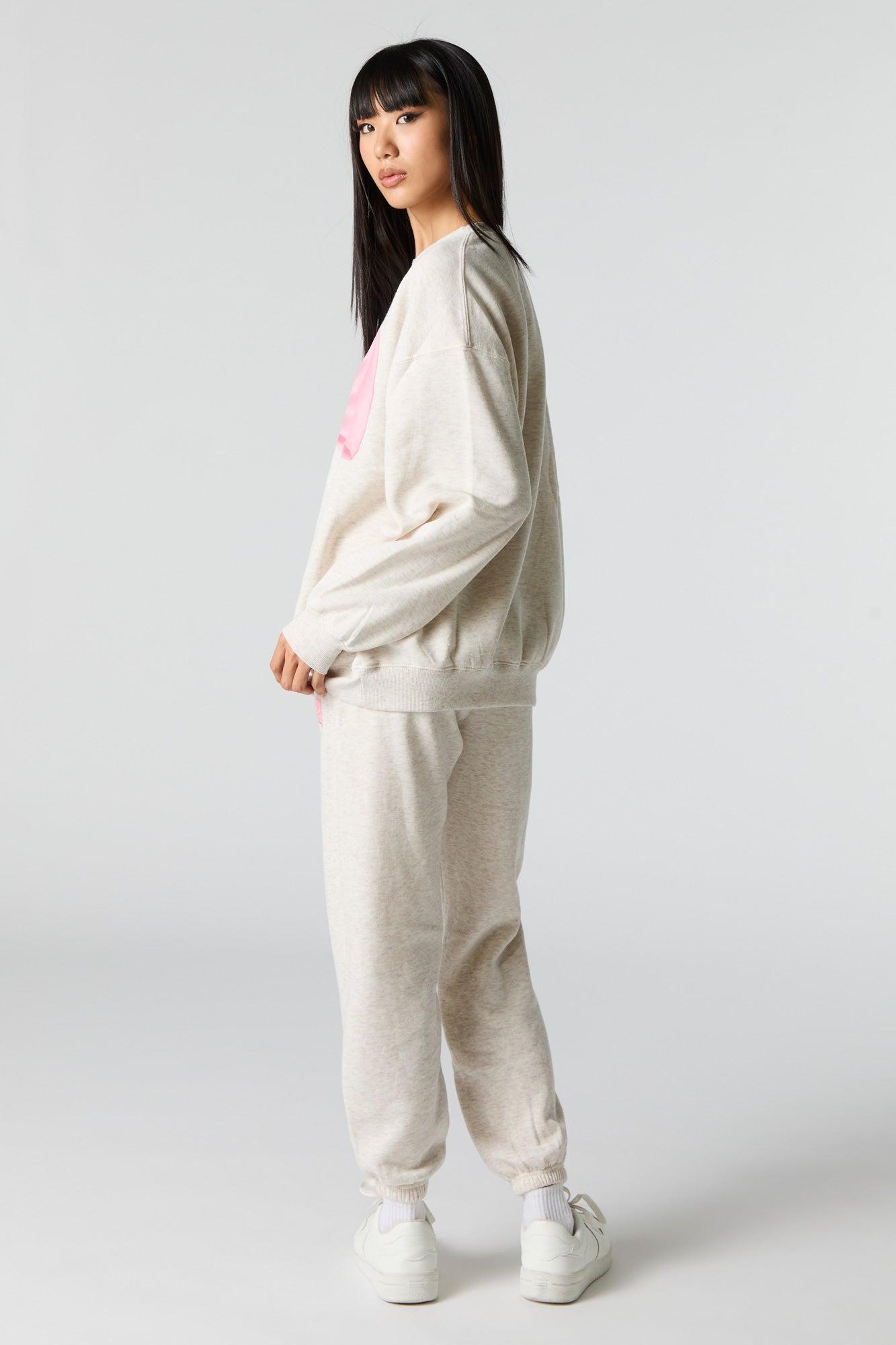 Cutesy Graphic Fleece Jogger Female Product Image