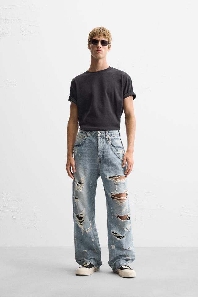 RIPPED EXTREME WASHED JEANS Product Image