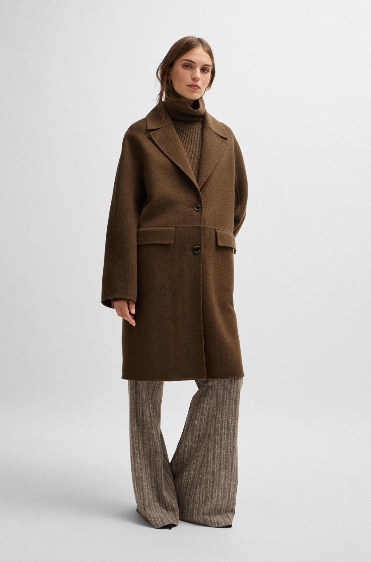 Wool coat with buttoned cuffs and signature accents product image