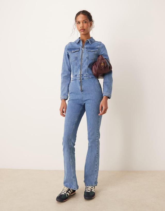 ASOS DESIGN denim long sleeve jumpsuit in mid blue Product Image