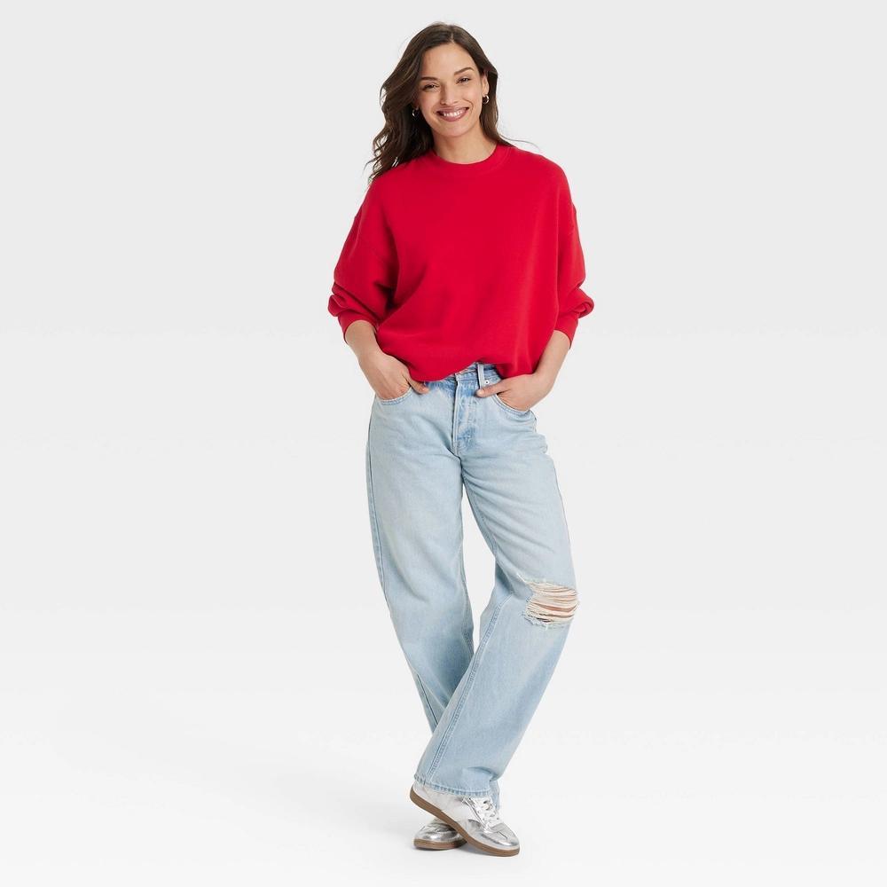 Women's Leisure Studio Oversized Pullover Sweatshirt - Universal Thread™ Red XS Product Image